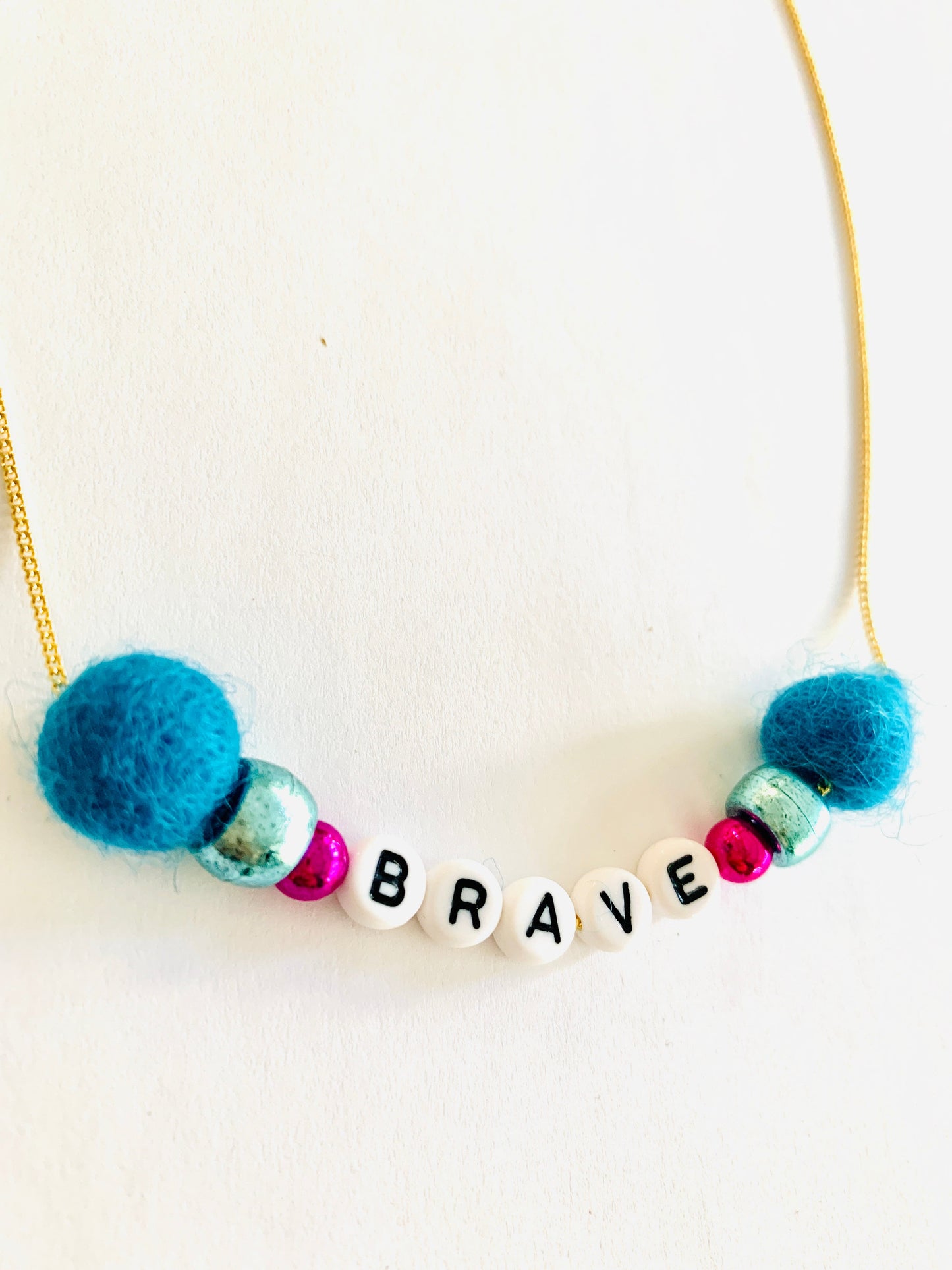 blue meaningful brave necklace