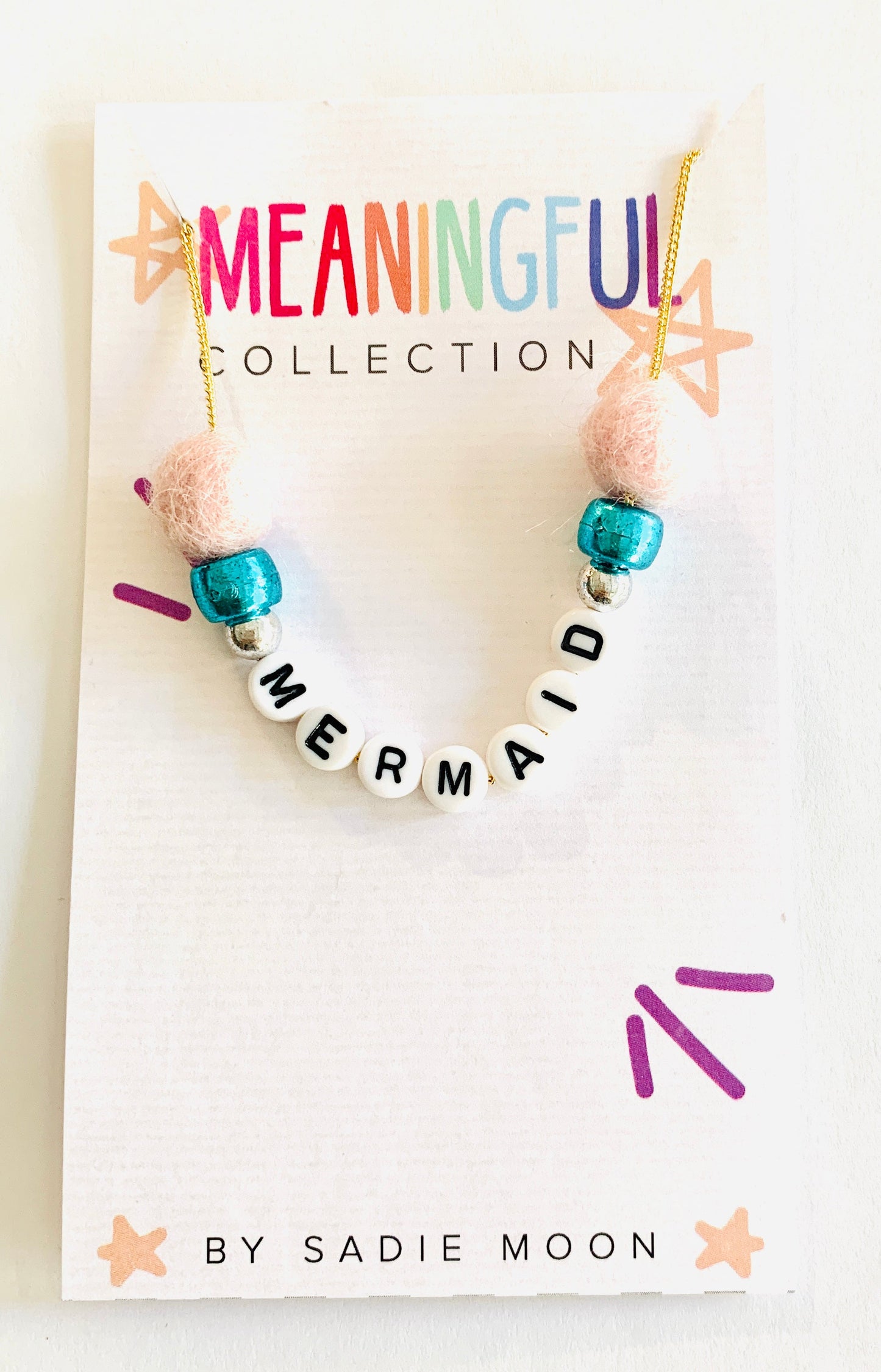 meaningful pom pom mermaid necklace