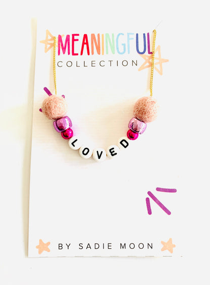 loved meaningful pom pom necklace