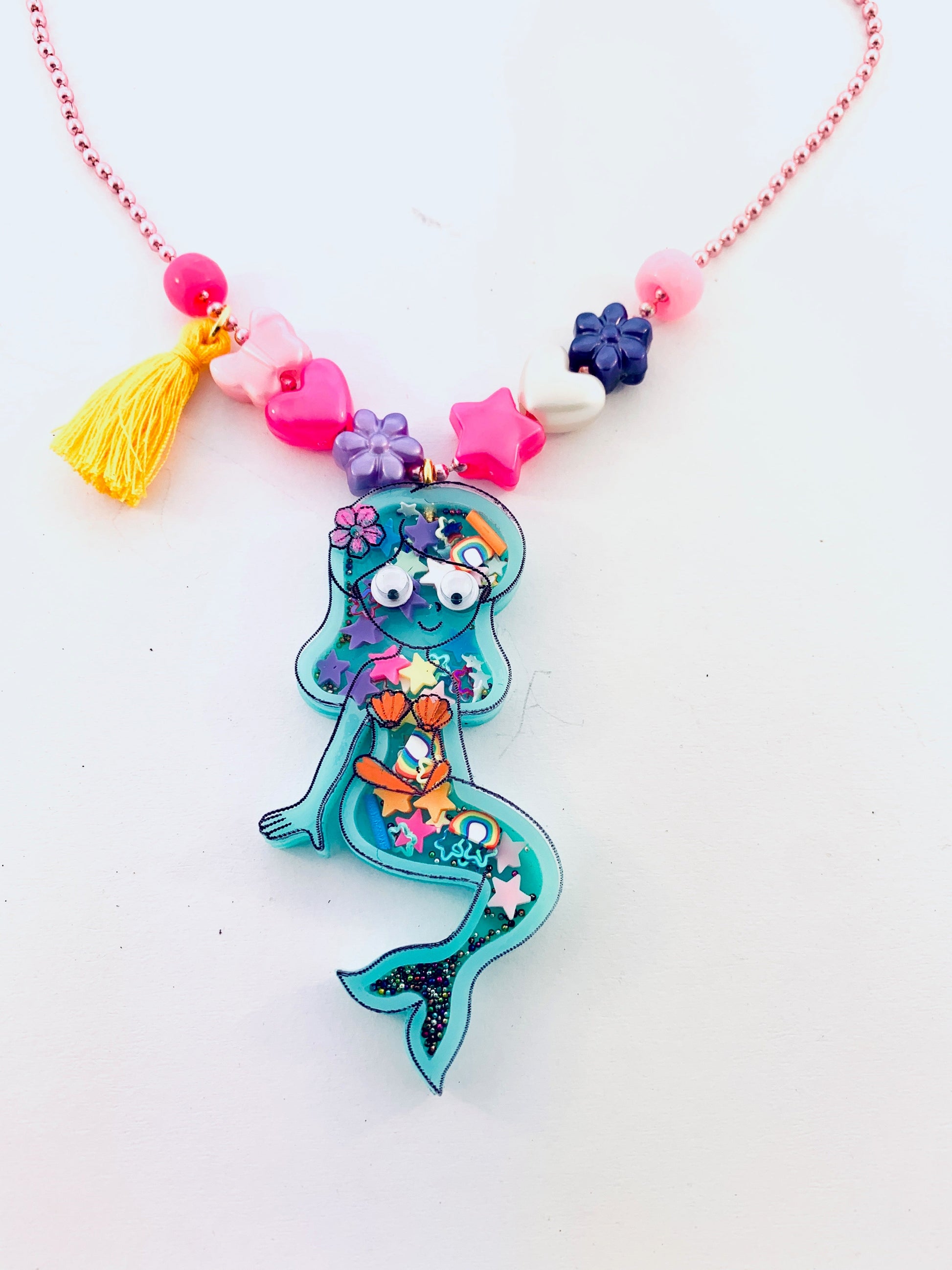 blue mermaid necklace with rainbows